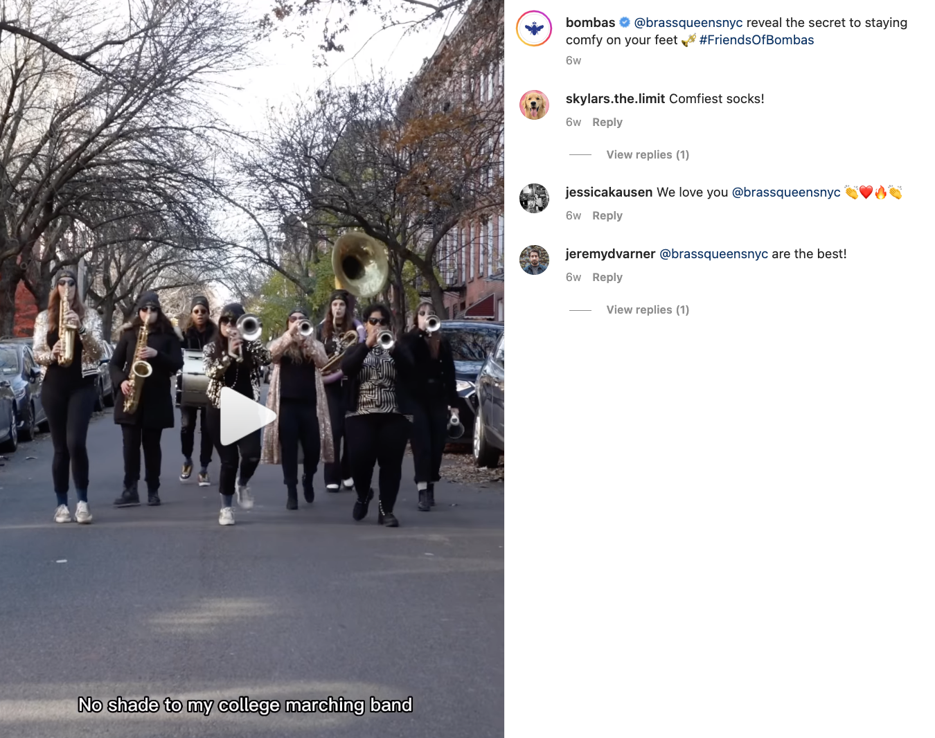 An Instagram Reel shows a group of women walking the streets of New York City. They are wearing colorful Bombas socks and playing brass instruments. They are all dressed in black. 
