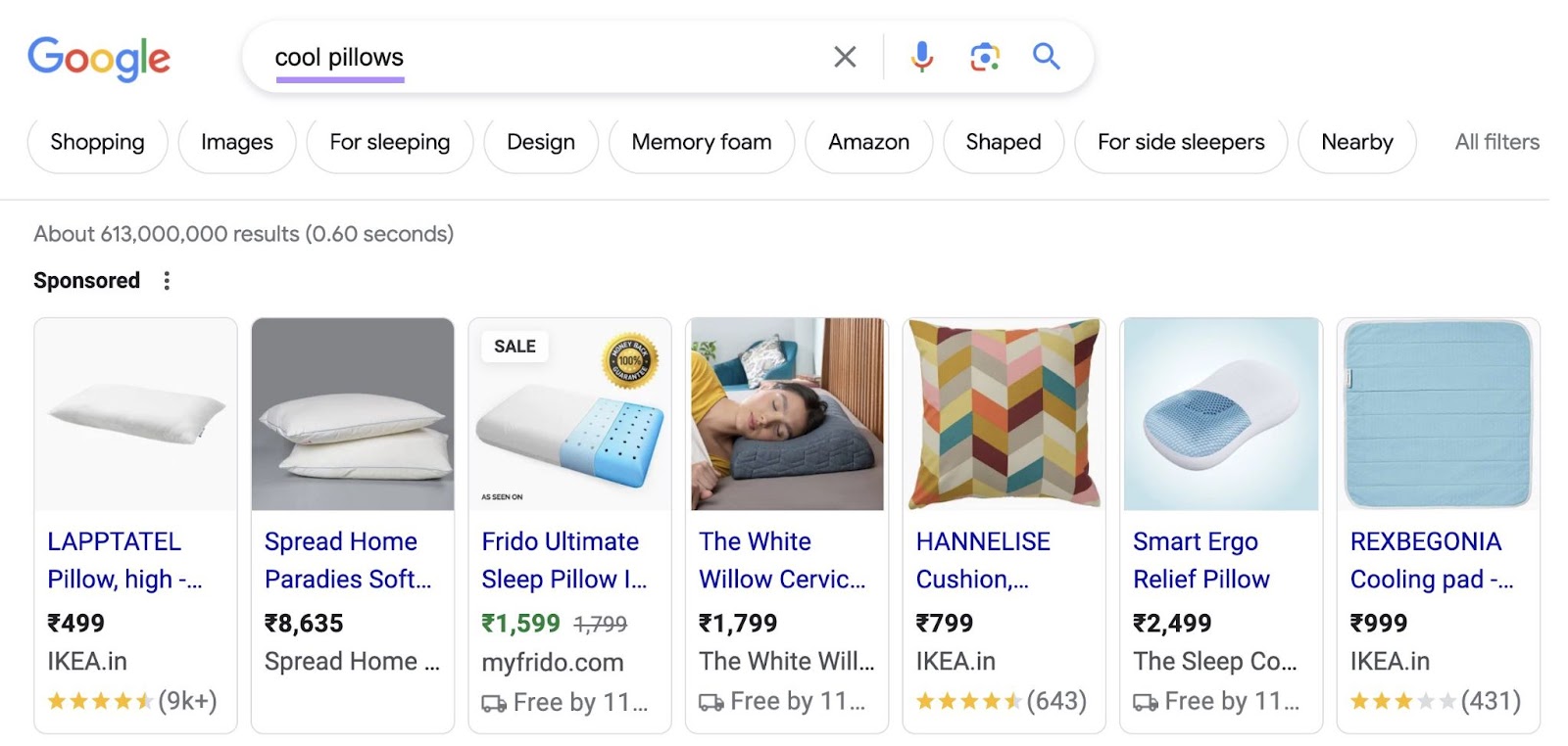 Google shopping ads for "cool pillows" query