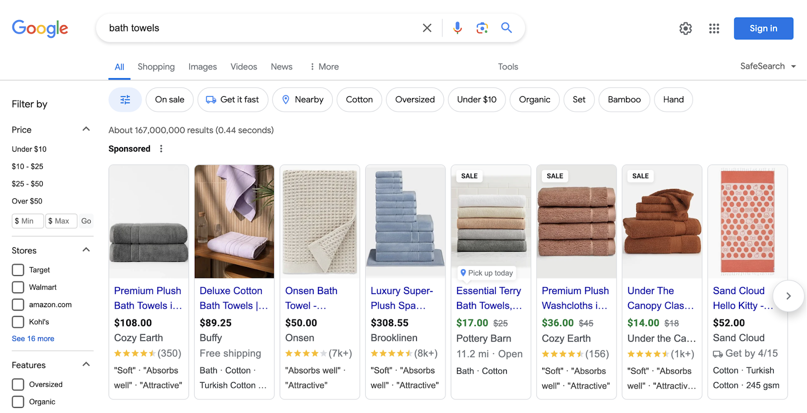 google serp with sponsored ads at the top showing towels from different companies
