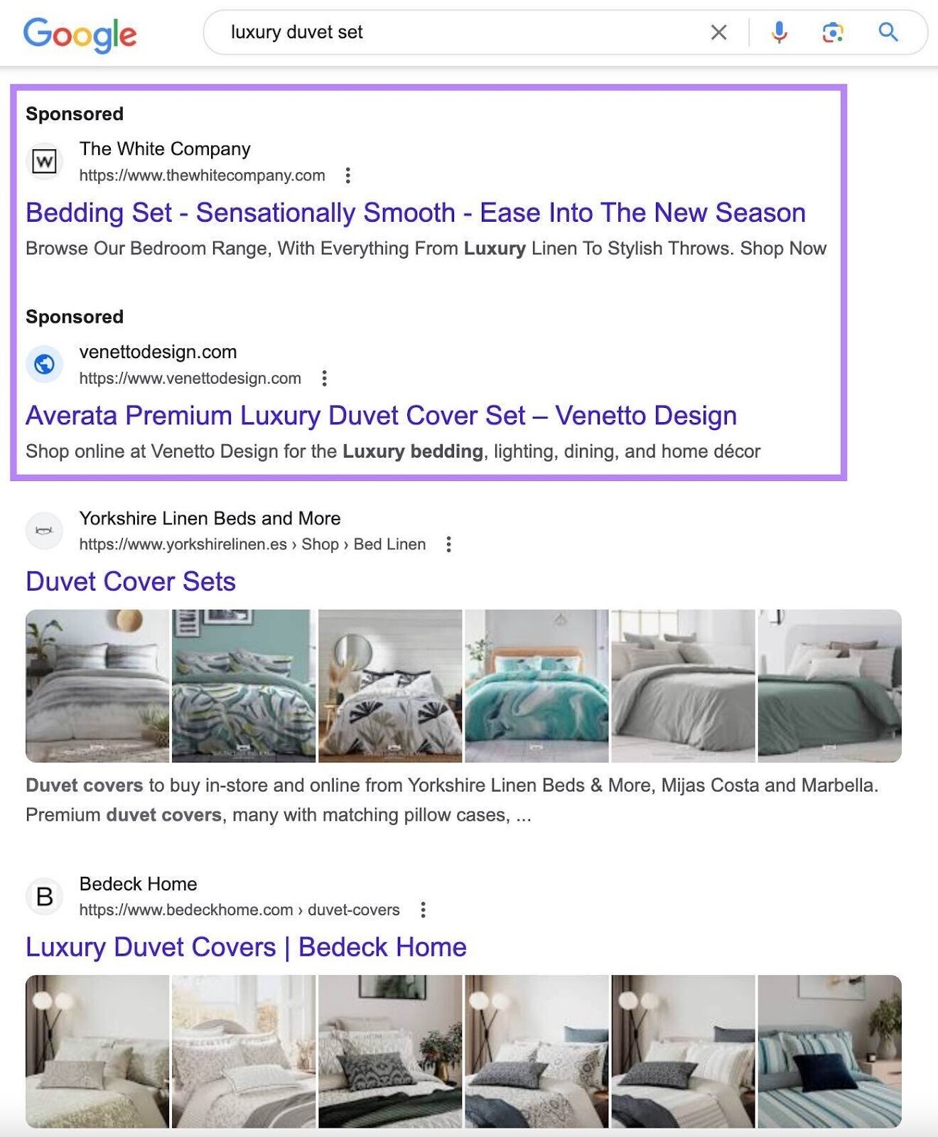 paid search ads at the top of a Google results page for "luxury duvet set"