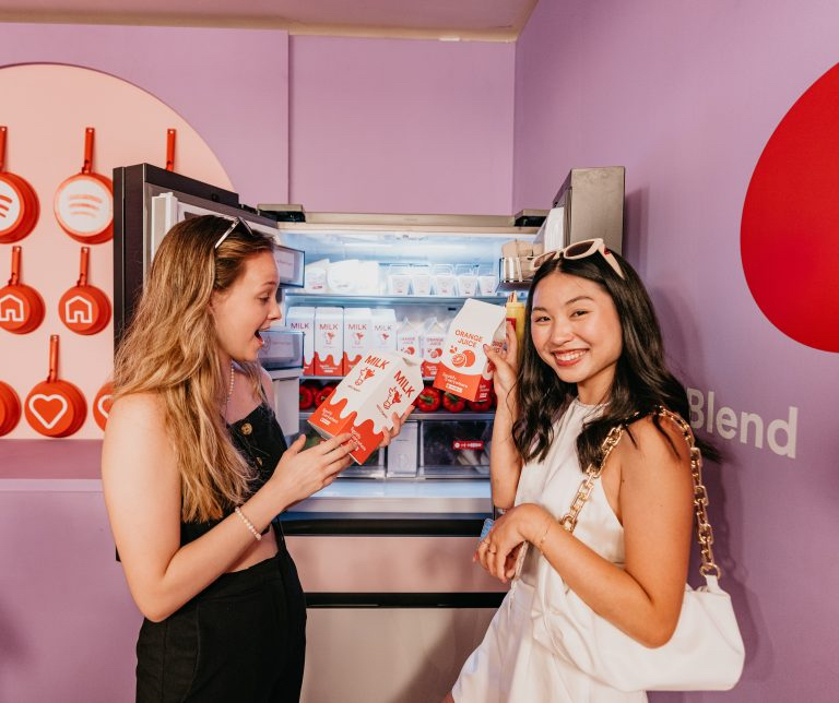 Spotify Everywhere's image featuring two girls in front of milk fridge