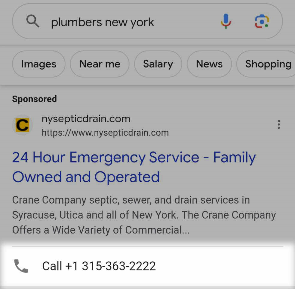 A tap-to-call button highlighted under Google ad