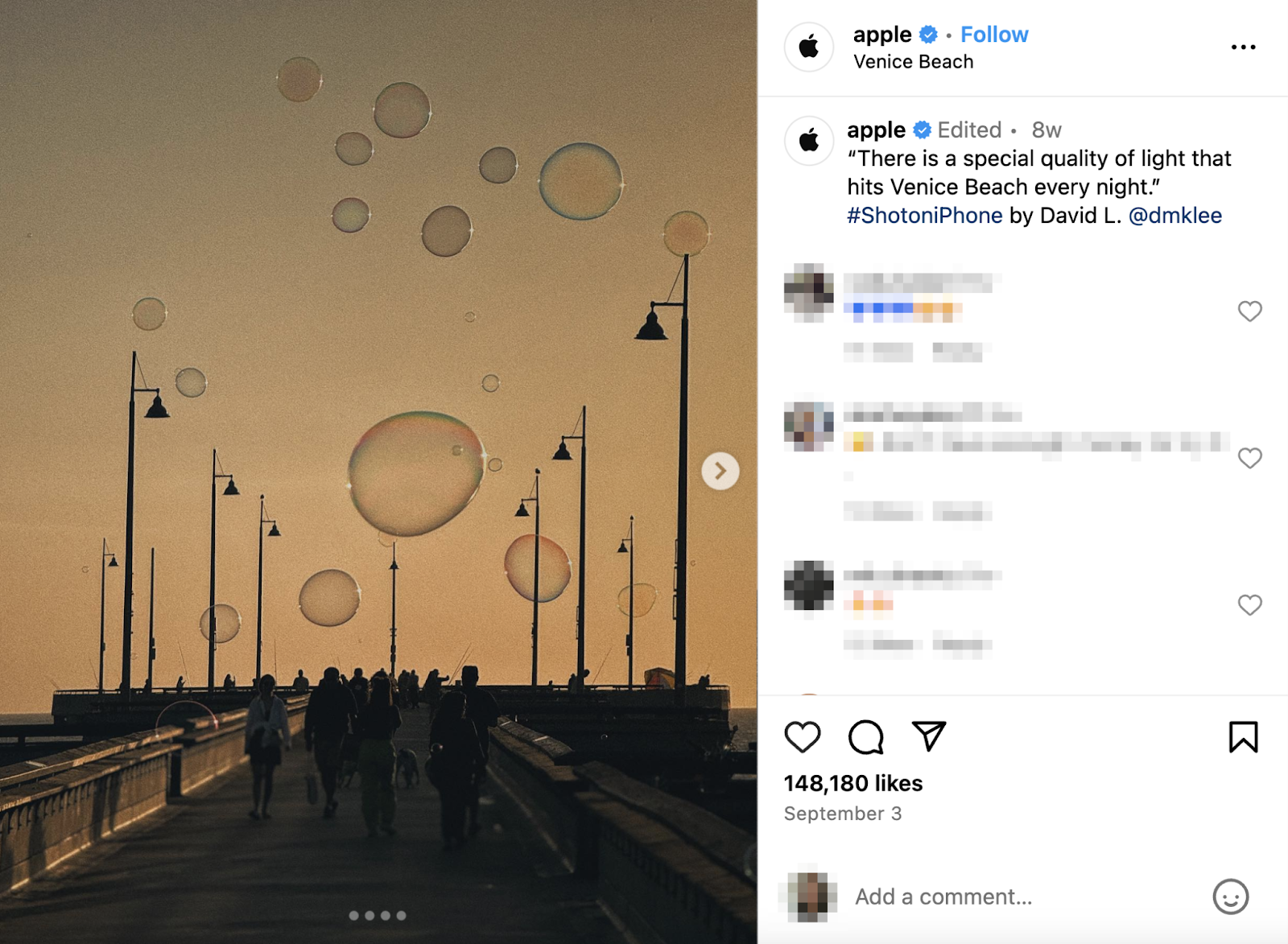 apple ugc content shows a photo of a boardwalk at sunset with large bubbles floating through the air. which was captured with an iphone