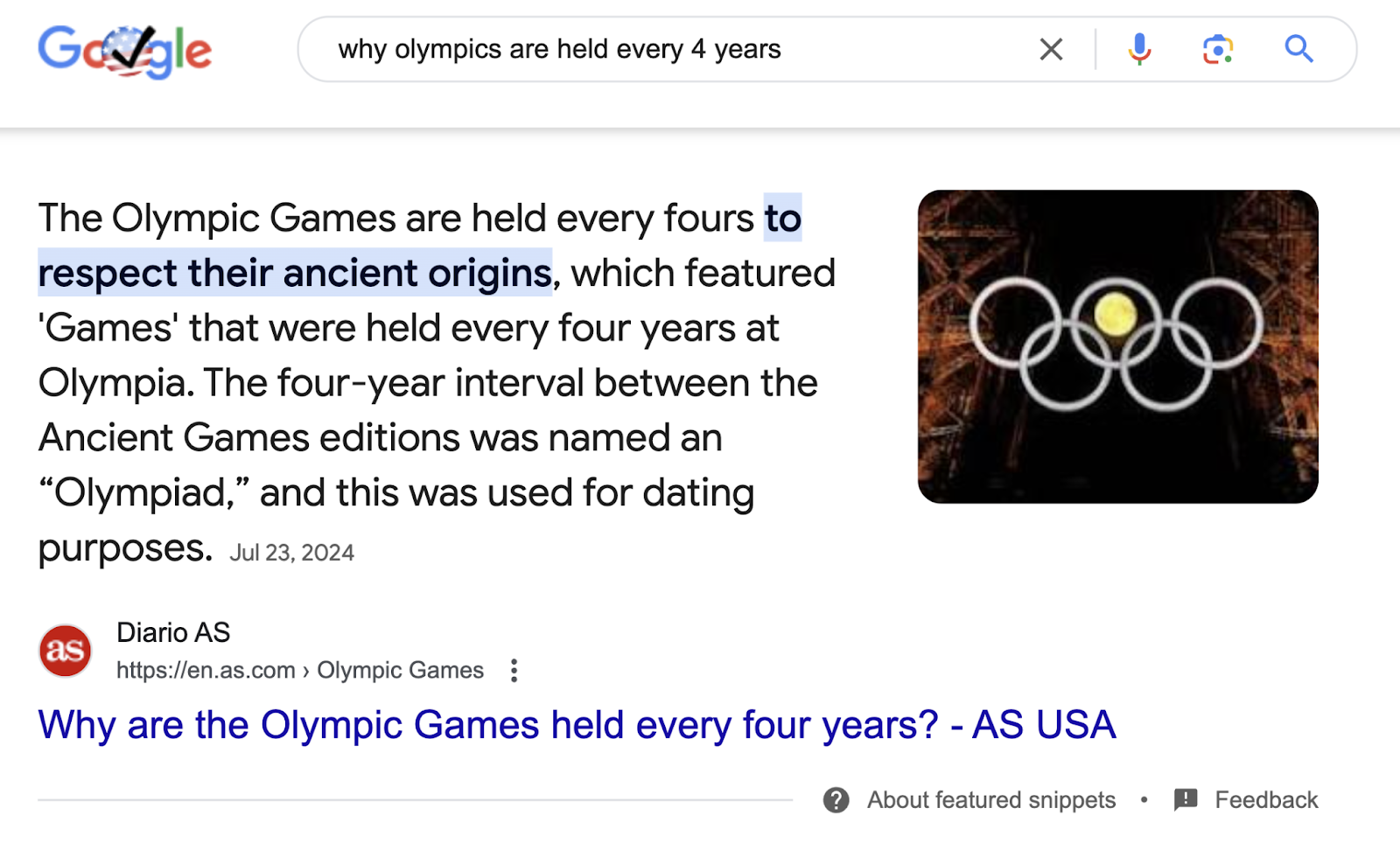 the featured snippet serp feature appears for the search "why olympics are held every 4 years." the featured snippet provides a brief answer and source.