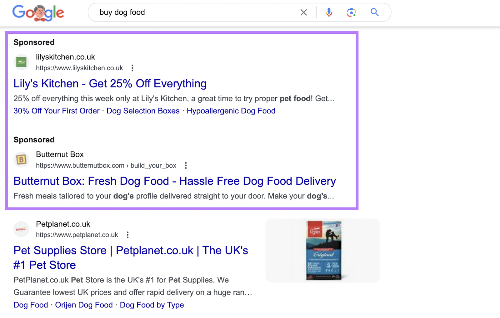 search ads for "buy dog food" query on search engine results page (SERP)