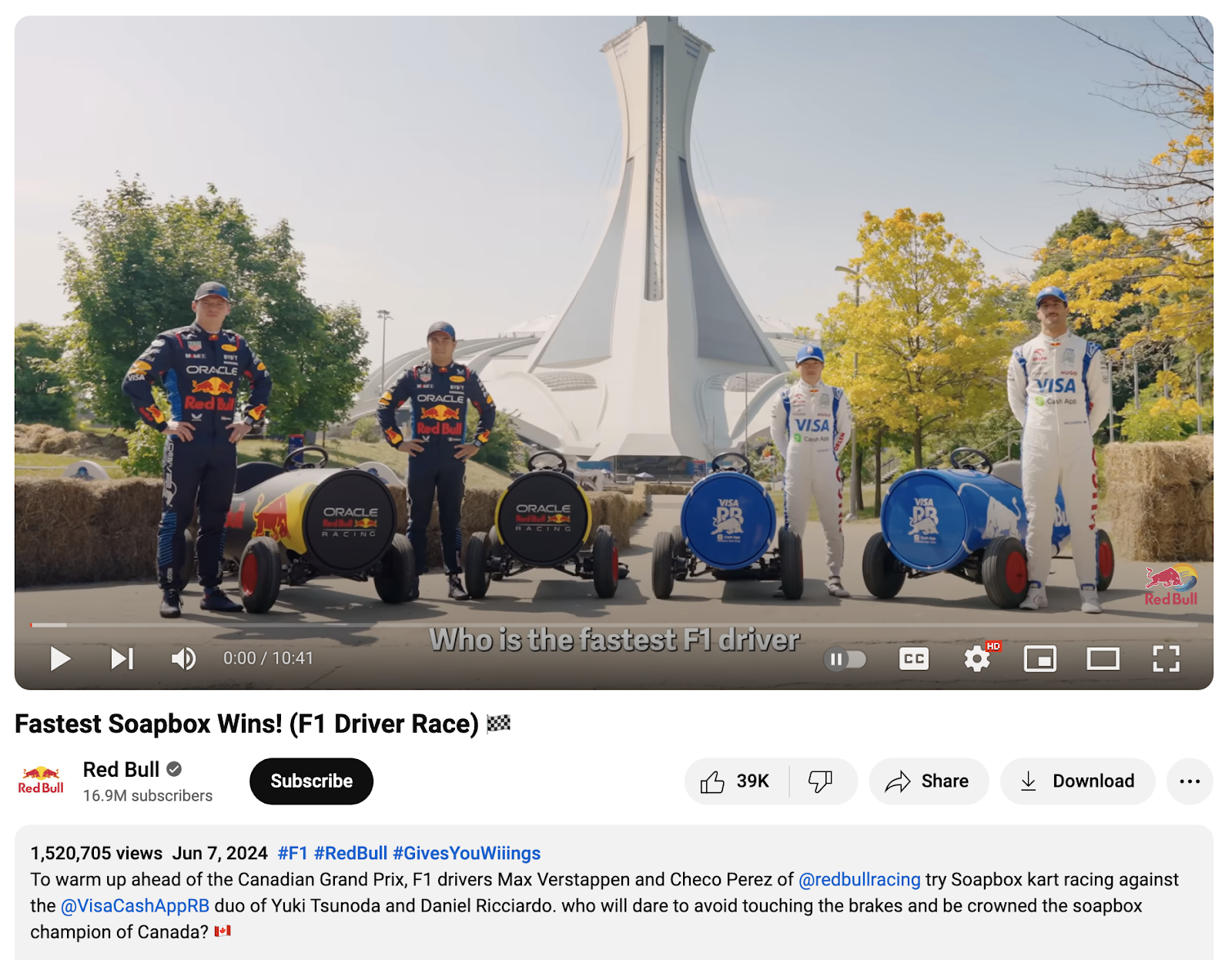 YouTube Red Bull video still showing four racers in branded uniforms with their soapbox karts at an outdoor event