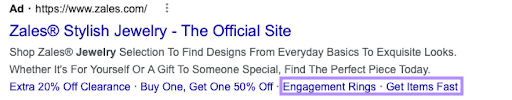 Zales' search add with two lines of copy displayed alongside the promotion extension