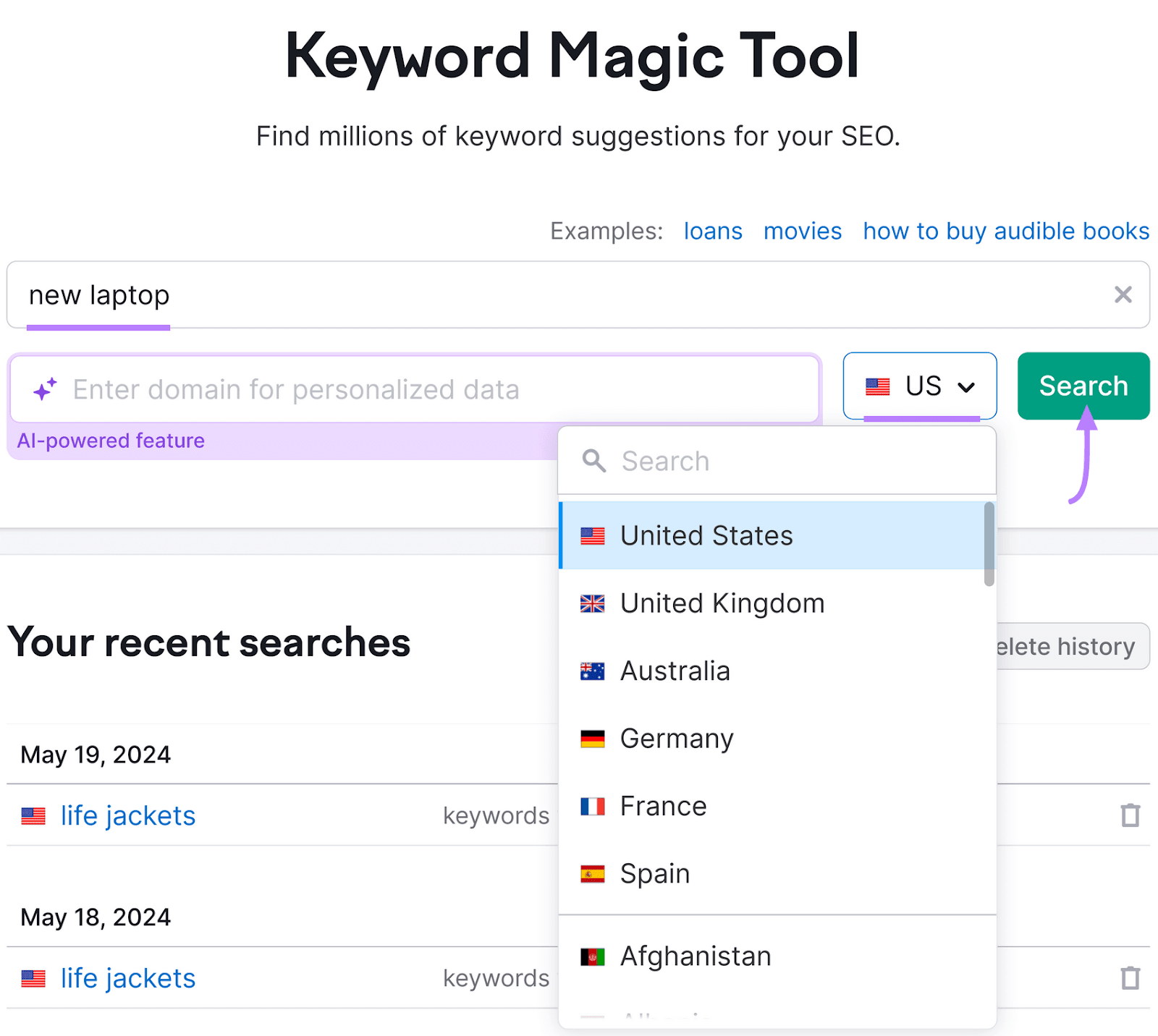 Keyword Magic Tool with a search bar where "new laptop" is typed, country selection drop-down, and a green "Search" button.