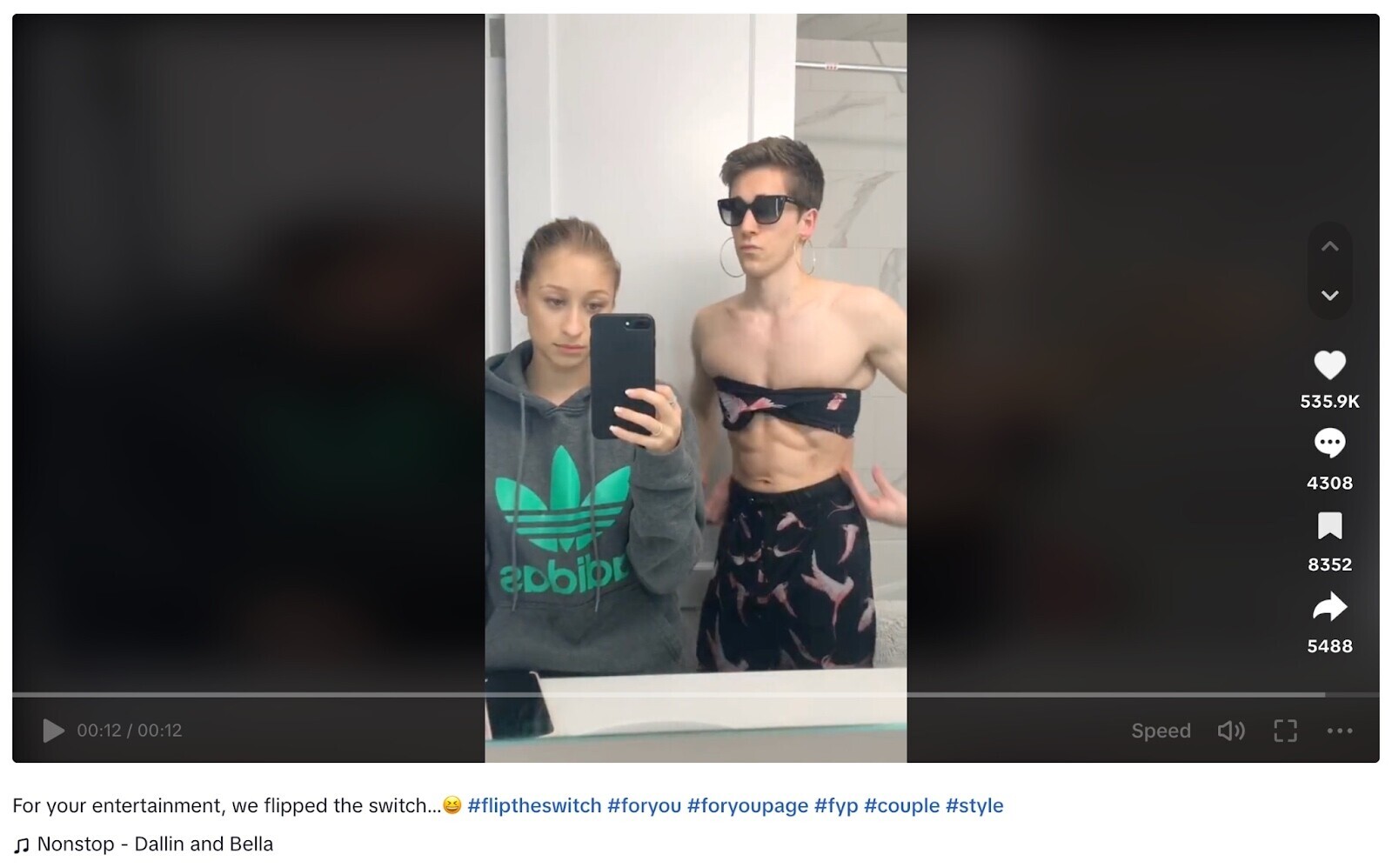 Two people in the TikTok challenge “Flip the Switch” in a changed outfit