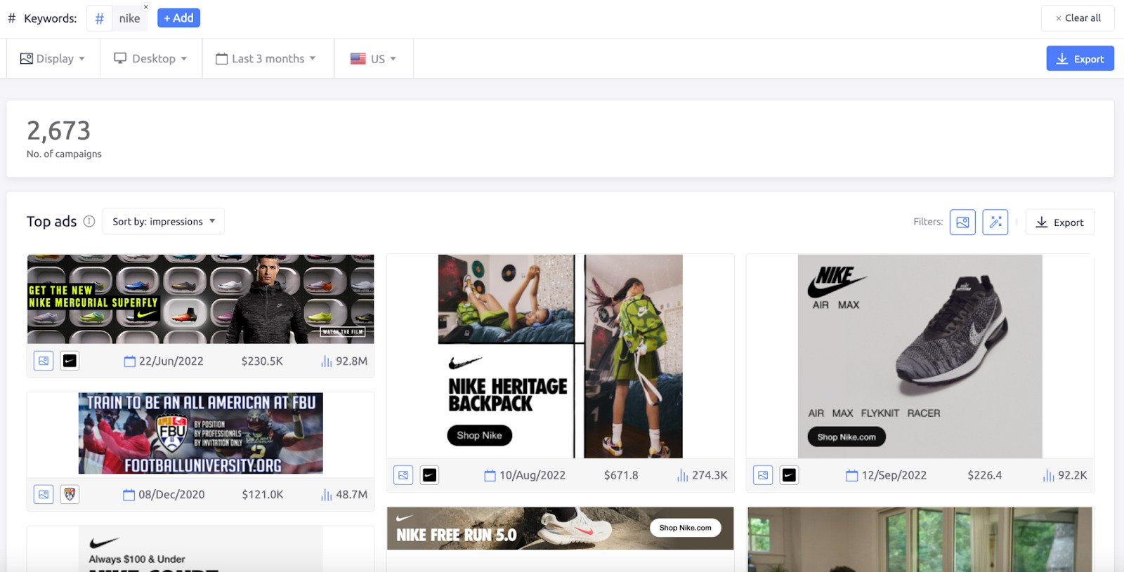 The AdClarity app shows the top display ads for Nike.