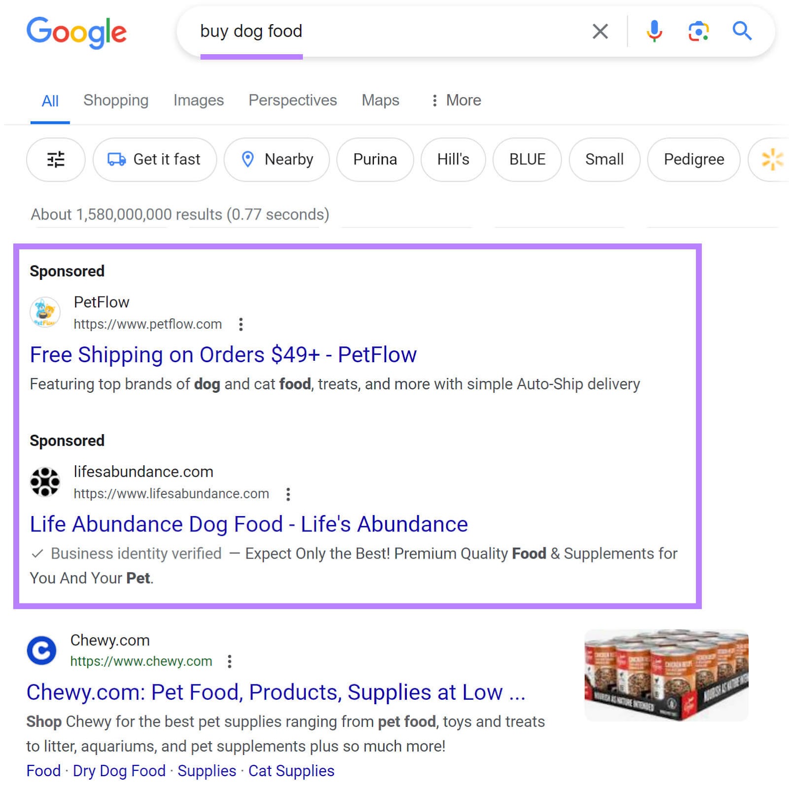 Search ads appearing on Google for "buy dog food" query appearing above the organic search results