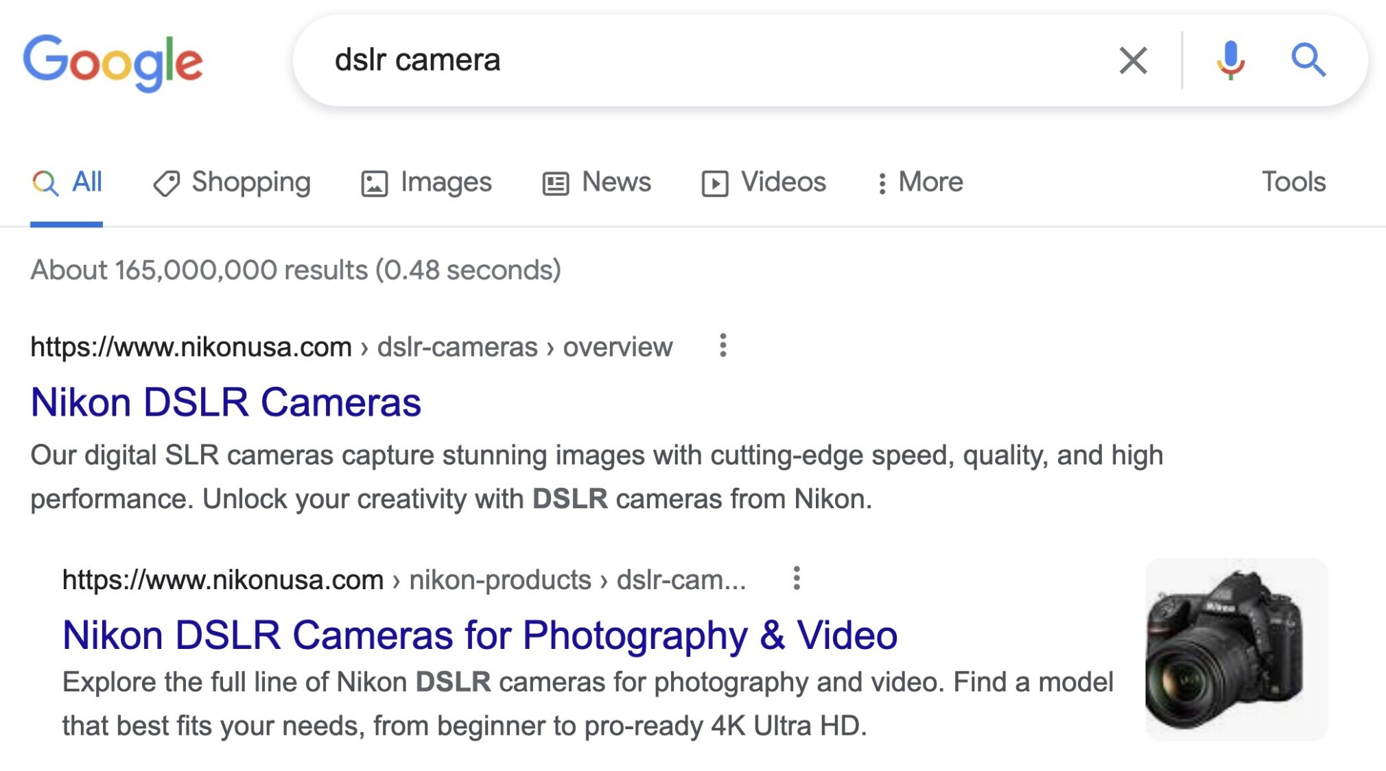 The search engine results page for the keyword "DSLR camera"