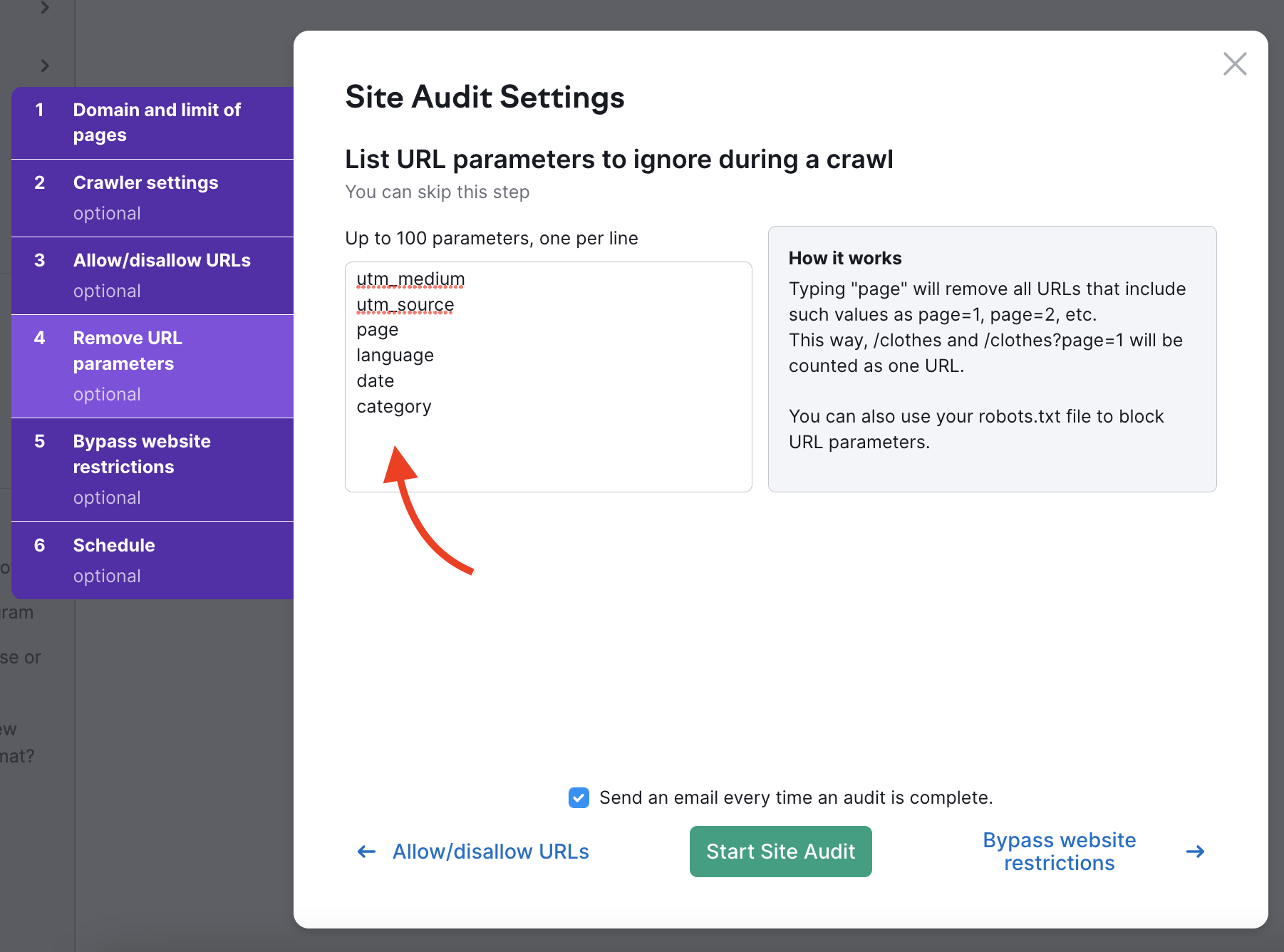 Remove URL parameters step in Site Audit settings. In the parameters fields, several example options are displayed, with a red arrow pointing at them to bring attention to what the URL parameter format should look like to work.